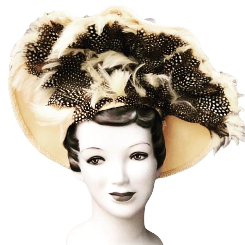 Vintage black and creme feathered hat. Absolutely gorgeous Derby Day piece.